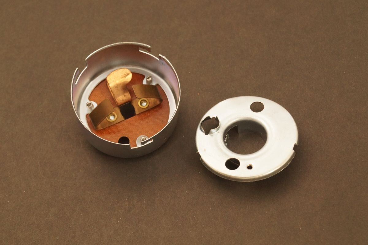Complete headlight base Jawa kýv, pio